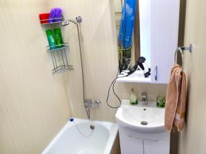 Kylpyhuone majoituspaikassa Lux Apartment on Mayakovsky 6