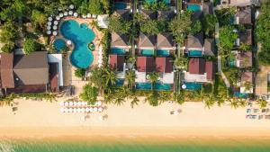 an aerial view of the beach and the resort at NH Collection Samui Peace Resort in Bophut