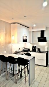 Kuchyň nebo kuchyňský kout v ubytování Marine Gardenia Seaside