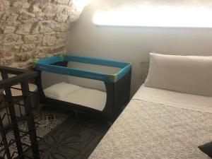 A bed or beds in a room at Dimora Le Zagare