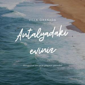 Una foto de la playa con las palabras Antigua Grandada Antigua en Hotel Villa Granada, en Antalya