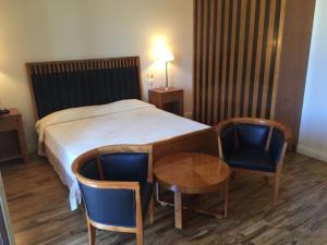 Postel nebo postele na pokoji v ubytování Hotel Certosa