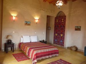 Letto o letti in una camera di Kasbah Timdaf