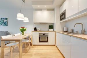 Kuchyňa alebo kuchynka v ubytovaní Wave Apartments - Nadmorze