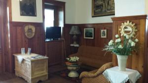 TV a/nebo společenská místnost v ubytování Hotel Savoia