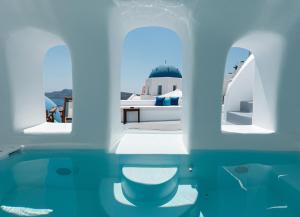 a view of a bathroom with blue and white at Oia Spirit Studios by Mary D Nomikou in Oia