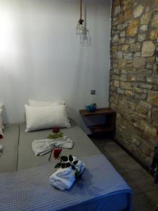 Postel nebo postele na pokoji v ubytování Anna Studios