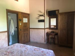Postel nebo postele na pokoji v ubytování Agriturismo La Baita