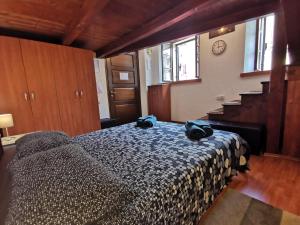 Posteľ alebo postele v izbe v ubytovaní Studio apartman Galerija