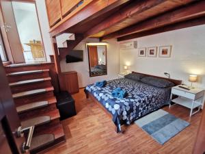 Posteľ alebo postele v izbe v ubytovaní Studio apartman Galerija
