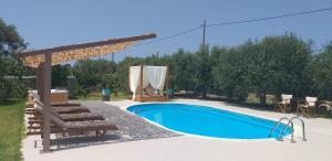 The swimming pool at or close to Stavlos