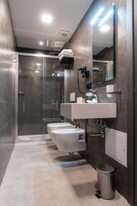 Kúpeľňa v ubytovaní Residence Hotel Moderno + 37 fotografií