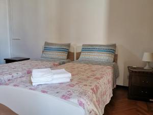 Letto o letti in una camera di b&b Wu Giada