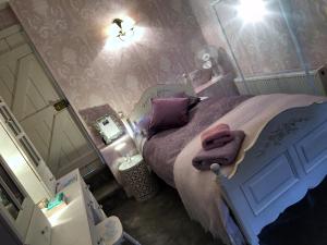Voodi või voodid majutusasutuse Ivy Cottage B&B toas