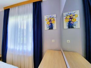 Кровать или кровати в номере ---Allegria House---
