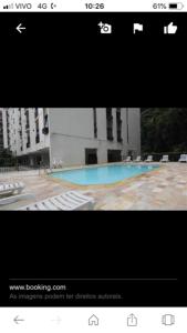 A piscina localizada em Lindo Apartamento para Reveillon Copacabana com Vista Mar e Fogos ou nos arredores