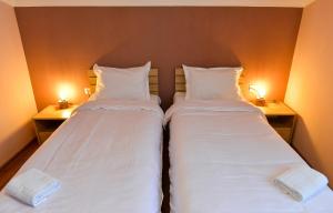 Кровать или кровати в номере ---Allegria House---