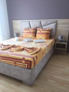 Postel nebo postele na pokoji v ubytování Apartments Adrian