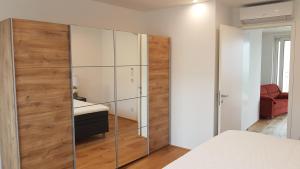 Posteľ alebo postele v izbe v ubytovaní Loft #11 mit großer Loggia und Terrasse