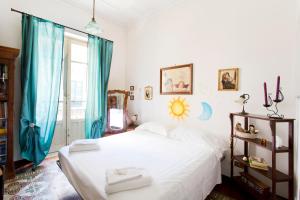Posteľ alebo postele v izbe v ubytovaní Maison Tulip