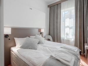 Voodi või voodid majutusasutuse Hamnhotellet toas