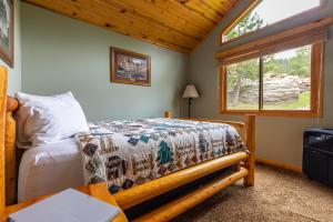 Ένα ή περισσότερα κρεβάτια σε δωμάτιο στο Lodge at Palmer Gulch