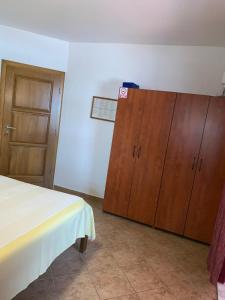Postel nebo postele na pokoji v ubytování Vila Tesmija