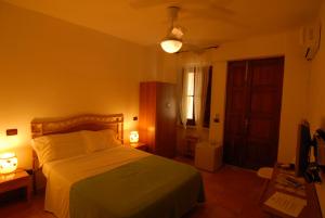 Postel nebo postele na pokoji v ubytování Eoliano B&B