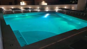 Bazén v ubytování Hotel La Contessa nebo v jeho okolí