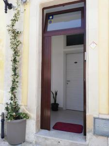 The facade or entrance of Casa Andolina White