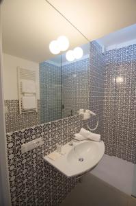 Koupelna v ubytování QuiHotel + 37 fotografií