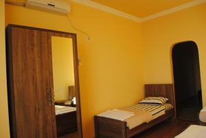 Letto o letti in una camera di David Guest House