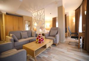 Posezení v ubytování Mado Hotel