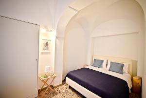 Posteľ alebo postele v izbe v ubytovaní Casa Giulia Holiday House
