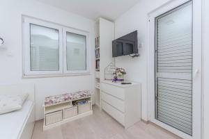 TV a/nebo společenská místnost v ubytování Apartment Mirjana
