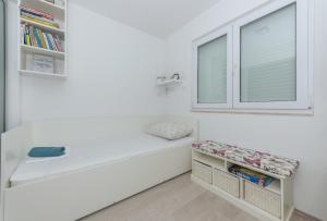 Postel nebo postele na pokoji v ubytování Apartment Mirjana