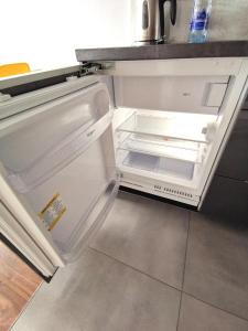 Kuchyňa alebo kuchynka v ubytovaní Apartament Cyprys 2