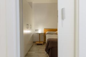Posteľ alebo postele v izbe v ubytovaní Apartamento en la Playa de la Fosca