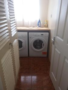 a washer and dryer in a small room at Summit View in Jamestown