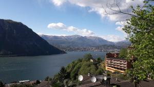 a view of a body of water with mountains at Casa Abel in Campione dʼItalia