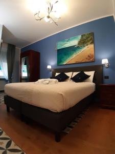 מיטה או מיטות בחדר ב-Jeans Luxury House