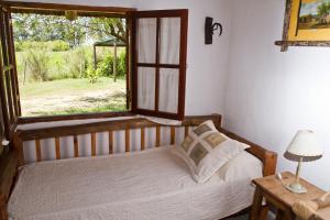 Una cama o camas en una habitación de Hosteria de Campo Valdemoro