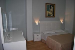 Letto o letti in una camera di Hotel & Restaurant White City