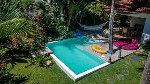 Bazén v ubytování Villa Strelitzia Cabarete nebo v jeho okolí