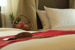 Letto o letti in una camera di Hotel Raniban Arcade
