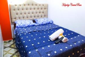 Letto o letti in una camera di Hospedaje Central Piura