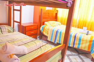 Letto o letti in una camera di Hospedaje Central Piura