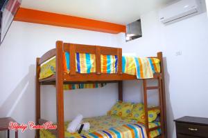 Letto o letti in una camera di Hospedaje Central Piura