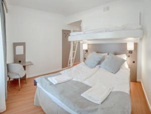 Voodi või voodid majutusasutuse Hamnhotellet toas