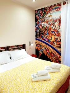 Letto o letti in una camera di B&B Gisira